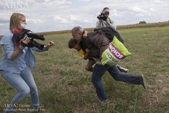 لگدزدن فیلم‌بردار زن مجارستانی به پدر و فرزند آواره سوری+تصاویر